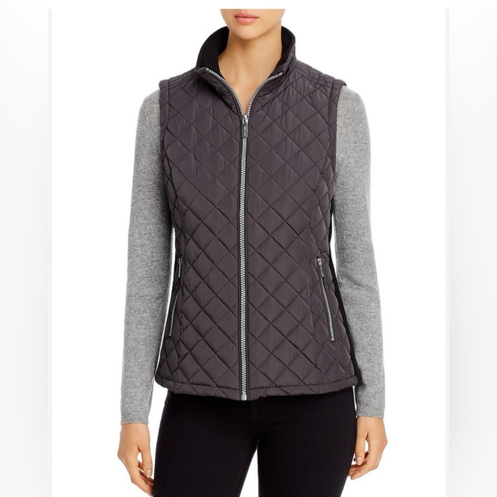 New York & co women’s size S black front zip quilted puffer vest. Stretch sides.